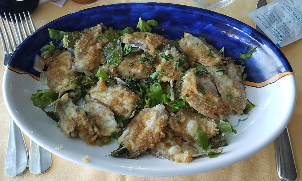 fresh anchovies on lemon leaves